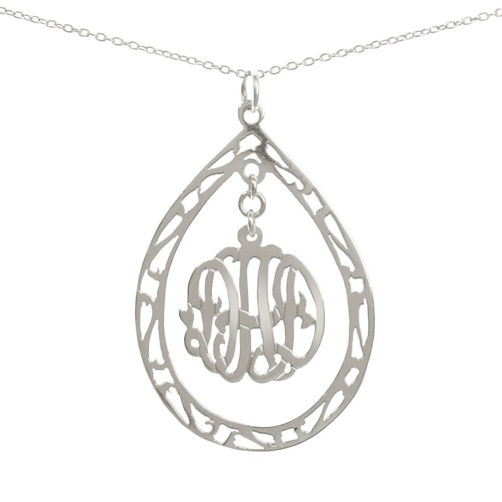 14K gold-plated silver round monogram necklace hanging inside a hollow teardrop pendant