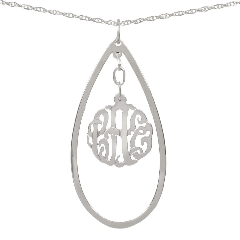 silver necklace with monogram hanging inside a hollow teardrop pendant